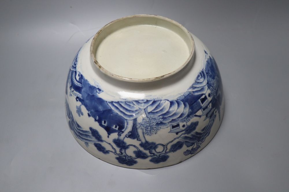 A Chinese blue and white bowl, 25cm, restored